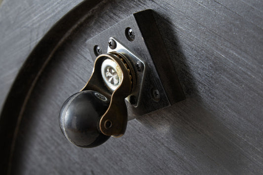 Dyonton - Round Cocktail Table - Light Grayish Brown